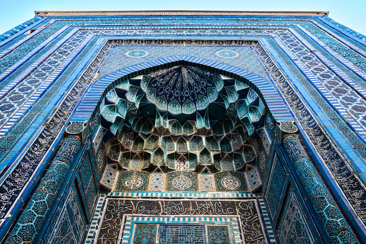 Detailed architectural tile work at Shah-i-Zinda in Samarkand, showcasing Islamic artistry.
